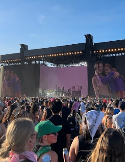 Olivia Rodrigo hugs Addison Rae during a surprise appearance to perform "Headphones On" and Rodrigo's new single, "Drop Dead," at the Coachella Valley Music and Arts Festival on Saturday, April 18.