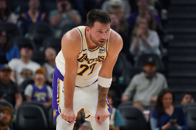 Feb 28, 2026; San Francisco, California, USA; Los Angeles Lakers forward/guard Luka Doncic (77) waits for play to resume against the Golden State Warriors in the second quarter at Chase Center. Mandatory Credit: David Gonzales-Imagn Images