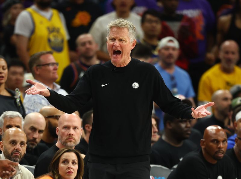 Apr 17, 2026; Phoenix, Arizona, USA; Golden State Warriors head coach Steve Kerr reacts against the Phoenix Suns during the second half in the play-in rounds of the 2026 NBA Playoffs at Mortgage Matchup Center. Mandatory Credit: Mark J. Rebilas-Imagn Images