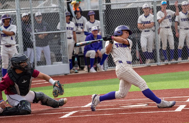 Tokay hosts Edison high for a varsity baseball game Monday April 20. Tokay’s Myka Apalit takes a big swing against Edison.