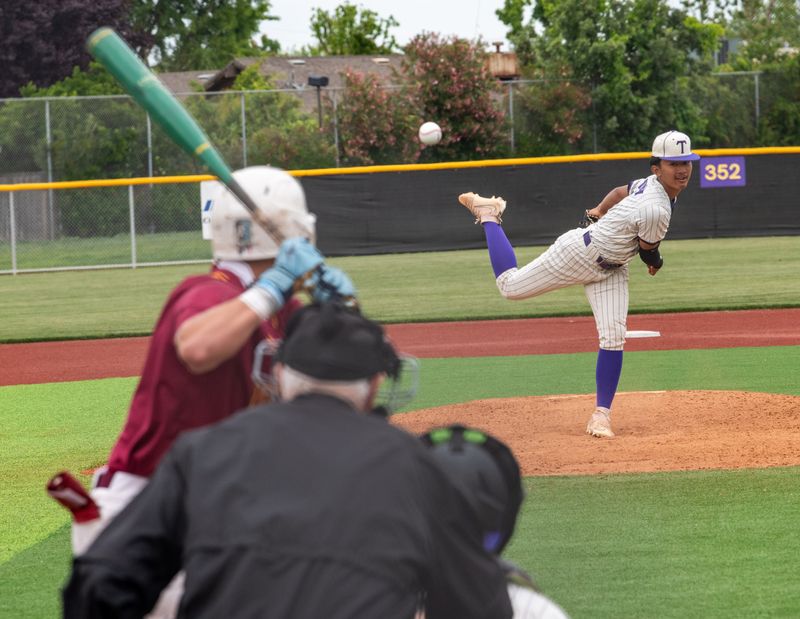 Tokay hosts Edison high for a varsity baseball game Monday April 20. Tokay starting pitcher Alex Preap throws against Edison.