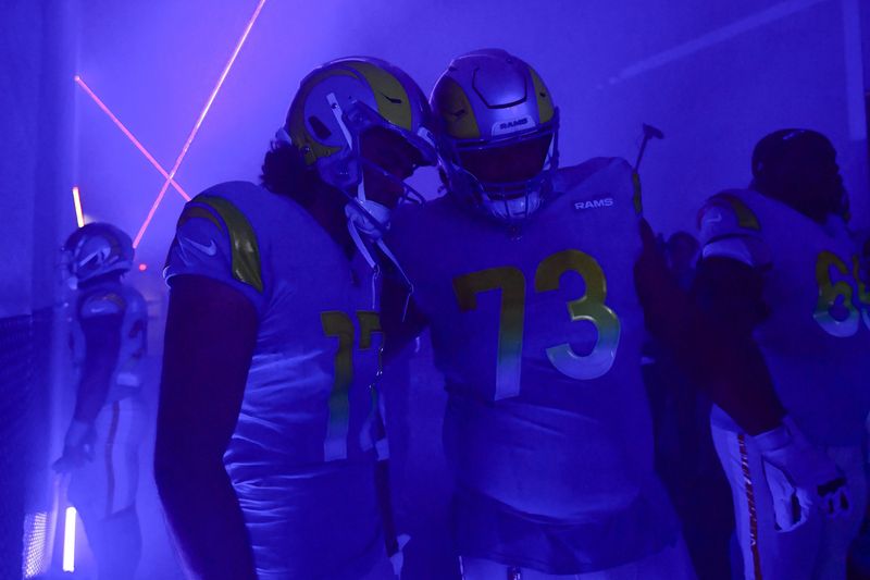 Dec 17, 2023; Inglewood, California, USA; Los Angeles Rams wide receiver Puka Nacua (17) and guard Steve Avila (73) before playing against the Washington Commanders at SoFi Stadium. Mandatory Credit: Gary A. Vasquez-USA TODAY Sports