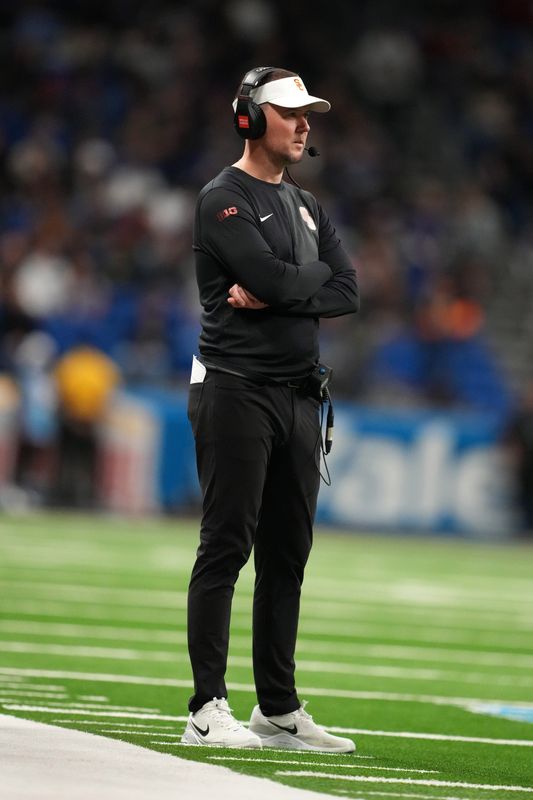 Dec 30, 2025; San Antonio, TX, USA; Southern California Trojans head coach Lincoln Riley watches from the sidelines against the TCU Horned Frogs in the first half during the Alamo Bowl at Alamodome. Mandatory Credit: Kirby Lee-Imagn Images