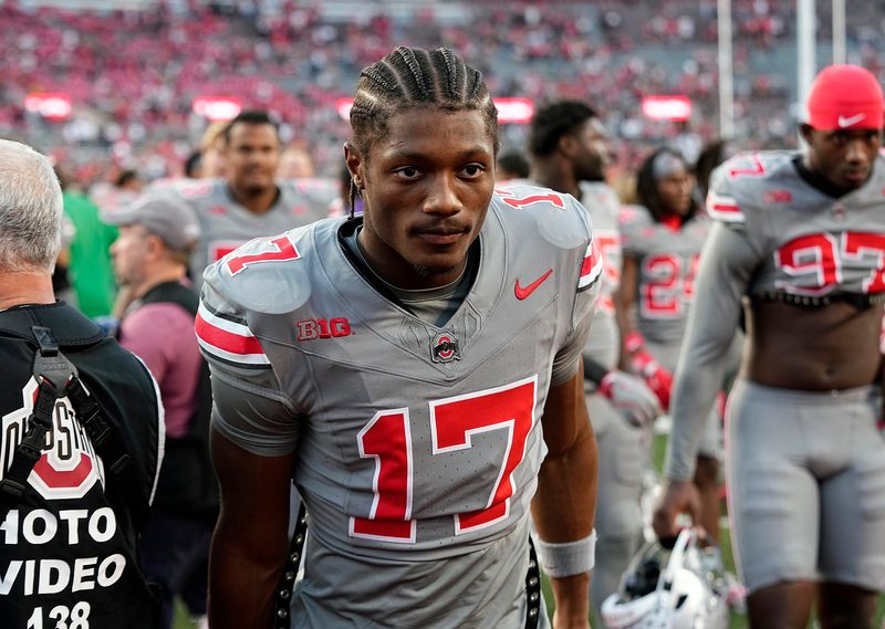 Oct 5, 2024; Columbus, OH, USA; Ohio State Buckeyes wide receiver Carnell Tate (17) walks off the field after not playing against Iowa Hawkeyes during the NCAA football game at Ohio Stadium.