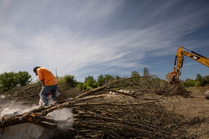 Conservationists are building rockwad homes in Redding to help young Sacramento River salmon and trout survive and thrive before they swim south.