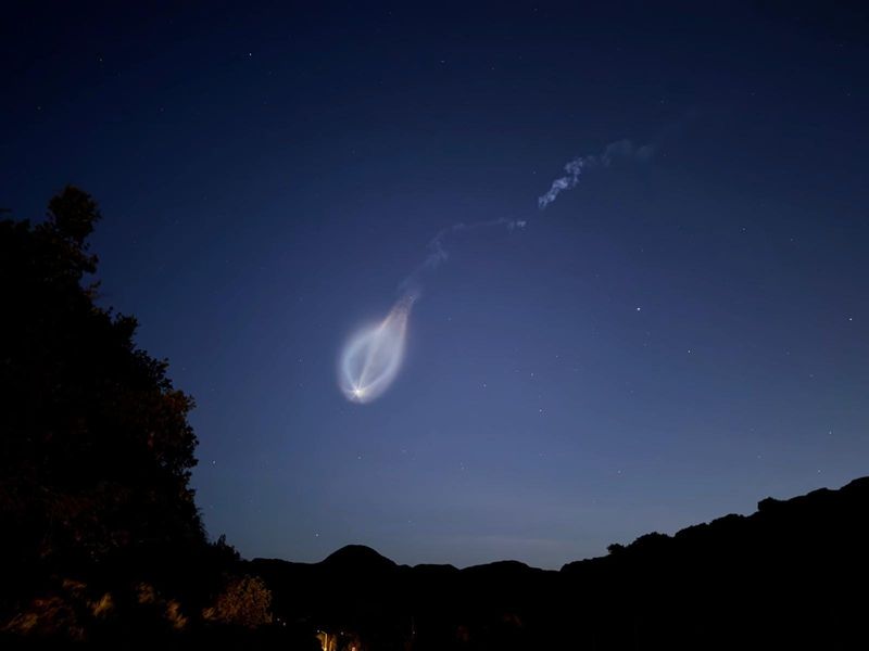 A SpaceX Falcon 9 rocket can be seen in the sky after launching April 22 from the Vandenberg Space Force Base in California.