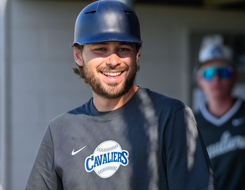Central Valley Christian's Head Coach Caleb Flores works with his team against Exeter in non-league baseball Thursday, April 23, 2026.