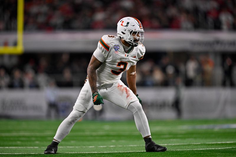 Dec 31, 2025; Arlington, TX, USA; Miami Hurricanes defensive lineman Akheem Mesidor (3) drops into position during the 2025 Cotton Bowl and quarterfinal game of the College Football Playoff at AT&T Stadium. Mandatory Credit: Jerome Miron-Imagn Images