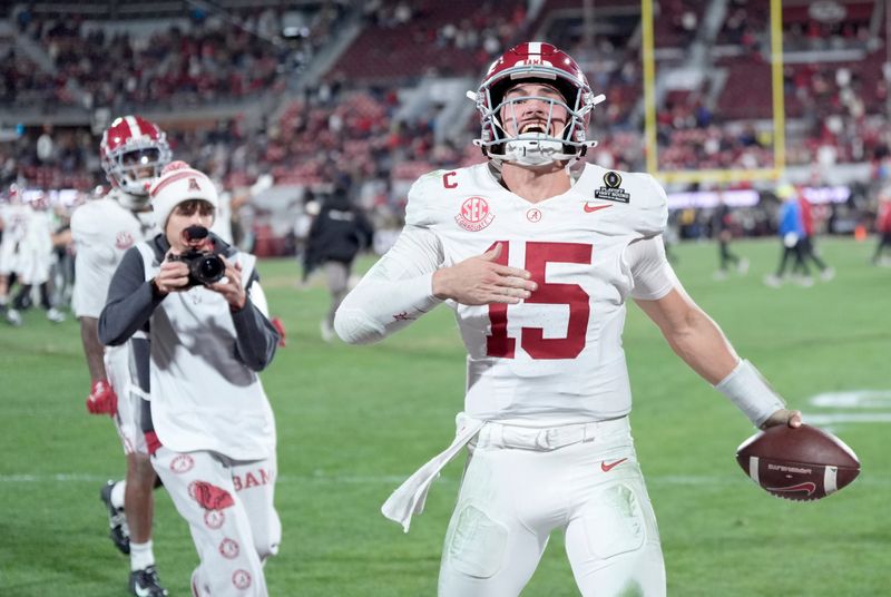 Alabama's Ty Simpson (15) celebrates following the College Football Playoff game between the University of Oklahoma Sooners (OU) and the Alabama Crimson Tide at the Gaylord Family Ã Oklahoma Memorial Stadium in Norman, Okla., Friday Dec. 19, 2025.