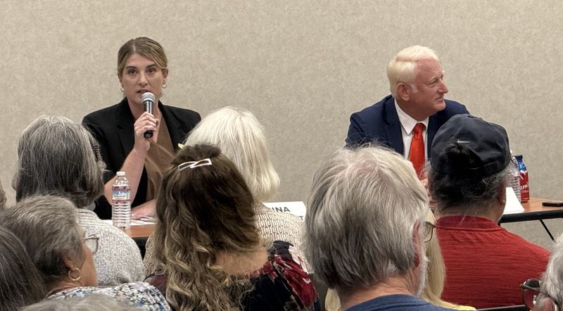 Joanna Francescut and Clint Curtis faced off in an April 22, 2026, League of Women Voters candidates forum at the Redding Library for the county registrar of voters race.