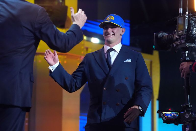 Apr 23, 2026; Pittsburgh, PA, USA; Alabama Crimson Tide quarterback Ty Simpson is selected by the Los Angeles Rams as the number 13 pick during the 2026 NFL Draft at Acrisure Stadium. Mandatory Credit: Kirby Lee-Imagn Images
