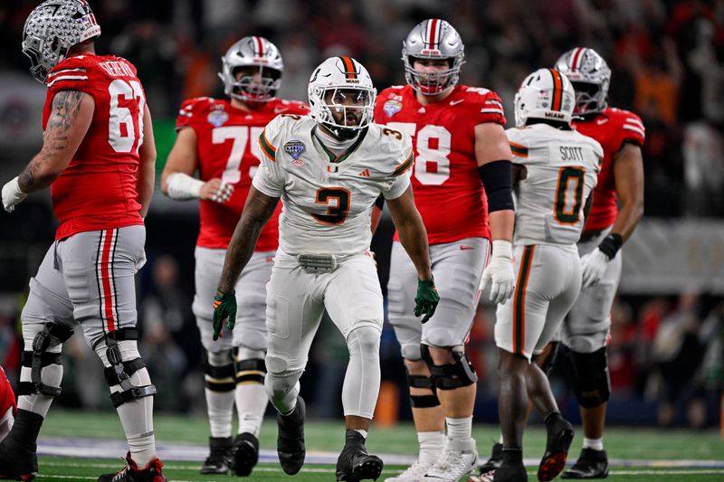 Dec 31, 2025; Arlington, TX, USA; Miami Hurricanes defensive lineman Akheem Mesidor (3) celebrates after he sacks Ohio State Buckeyes quarterback Julian Sayin (not pictured) during the 2025 Cotton Bowl and quarterfinal game of the College Football Playoff at AT&T Stadium. Mandatory Credit: Jerome Miron-Imagn Images