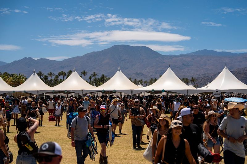 Festivalgoers arrive to the Stagecoach Music Festival in Indio on Friday, April 24.