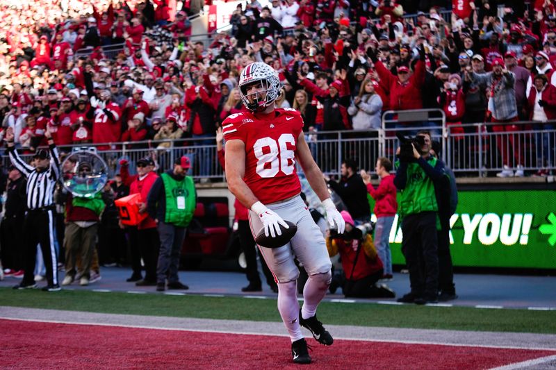 Ohio State Buckeyes tight end Max Klare (86) celebrates after scoring a touchdown in the second half of the NCAA football game at Ohio Stadium on Saturday, Nov. 22, 2025 in Columbus, Ohio.
