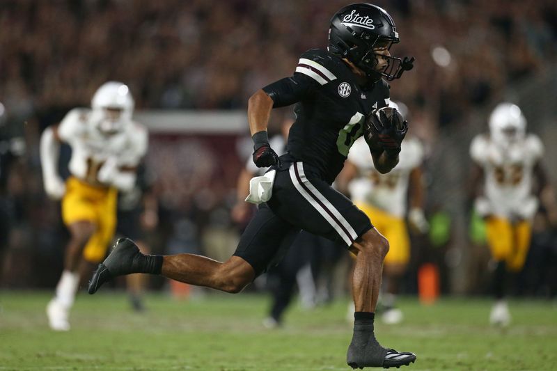 Sep 6, 2025; Starkville, Mississippi, USA; Mississippi State Bulldogs wide receiver Brenen Thompson (0) runs after a catch for a touchdown during the fourth quarter against the Arizona State Sun Devils at Davis Wade Stadium at Scott Field. Mandatory Credit: Petre Thomas-Imagn Images