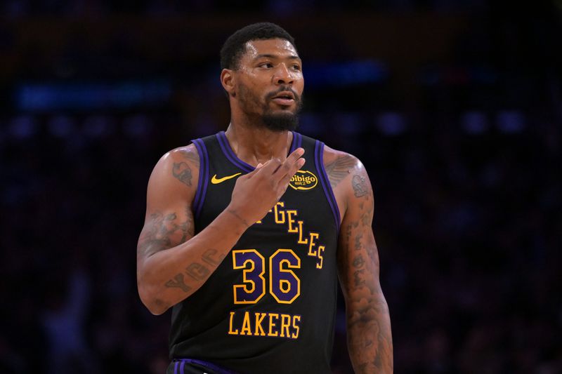 Apr 21, 2026; Los Angeles, California, USA; Los Angeles Lakers guard Marcus Smart (36) reacts after a three-point basket in the first half of game two of the first round of the 2026 NBA Playoffs against the Houston Rockets at Crypto.com Arena. Mandatory Credit: Jayne Kamin-Oncea-Imagn Images