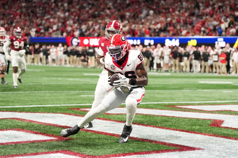 iDec 6, 2025; Atlanta, GA, USA; Georgia Bulldogs wide receiver Dillon Bell (86) makes a catch to score a touchdown during the second quarter against the Alabama Crimson Tide during the 2025 SEC Championship game at Mercedes-Benz Stadium. Mandatory Credit: Dale Zanine-Imagn Images