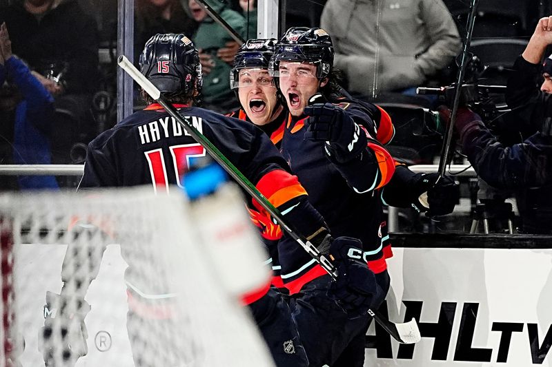 Firebirds forward Mitchell Stephens (67), center, celebrates his second-period goal against the Bakersfield Condors on April 25 at Acrisure Arena in Palm Desert.