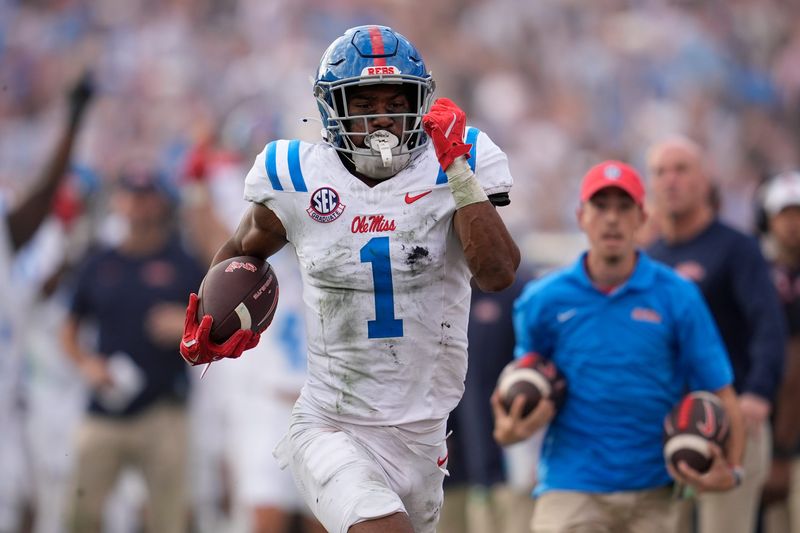 Oct 18, 2025; Athens, Georgia, USA; Mississippi Rebels wide receiver De'Zhaun Stribling (1) runs for a touchdown against the Georgia Bulldogs during the second half of the game at Sanford Stadium. Mandatory Credit: Dale Zanine-Imagn Images