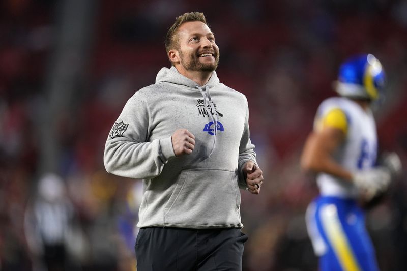 Dec 12, 2024; Santa Clara, California, USA; Los Angeles Rams head coach Sean McVay jogs on the field before the start of the game against the San Francisco 49ers at Levi's Stadium. Mandatory Credit: Cary Edmondson-Imagn Images