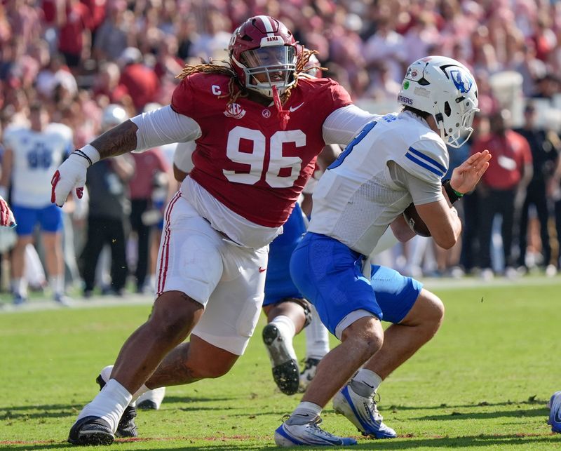 Nov 22, 2025; Tuscaloosa, Alabama, USA; Alabama defensive lineman Tim Keenan III (96) sacks Eastern Illinois quarterback Cole LaCrue (3) at Saban Field at Bryant-Denny Stadium. Mandatory Credit: Gary Cosby Jr.-Imagn Images