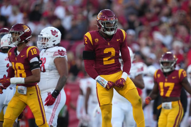 Oct 21, 2023; Los Angeles, California, USA; Southern California Trojans defensive end Romello Height (2) celebrates against the Utah Utes in the first half at United Airlines Field at Los Angeles Memorial Coliseum. Mandatory Credit: Kirby Lee-USA TODAY Sports