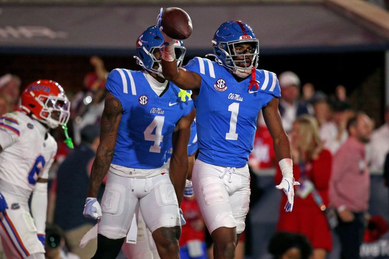 Nov 15, 2025; Oxford, Mississippi, USA; Mississippi Rebels wide receiver De'Zhaun Stribling (1) reacts after a touchdown during the second quarter against the Florida Gators at Vaught-Hemingway Stadium. Mandatory Credit: Petre Thomas-Imagn Images