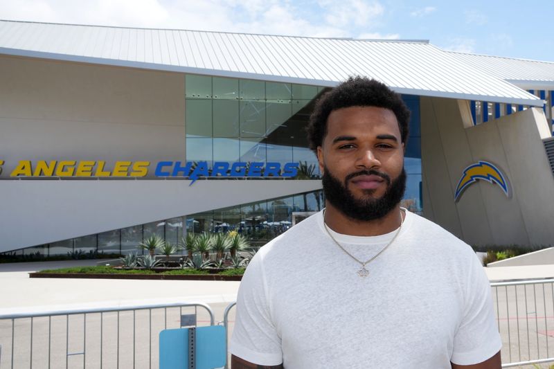 Apr 25, 2026; El Segundo, CA, USA; Los Angeles Chargers defensive end Akheem Mesidor poses during the Chargers Draft Open House at The Bolt. Mandatory Credit: Kirby Lee-Imagn Images