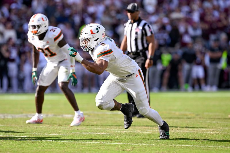 Dec 20, 2025; College Station, TX, USA; Miami Hurricanes defensive lineman Akheem Mesidor (3) rushes the line during the game between the Aggies and the Hurricanes at Kyle Field. Mandatory Credit: Jerome Miron-Imagn Images