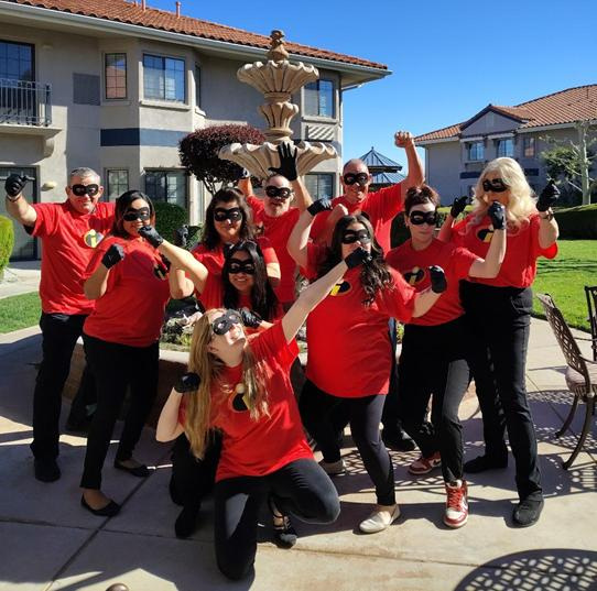 The Whispering Winds of Apple Valley staff sported superhero costumes from the animated film “The Incredibles” to celebrate accomplishing a heroic feat.
