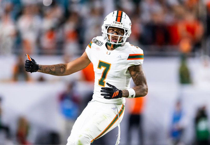 Jan 19, 2026; Miami Gardens, FL, USA; Miami Hurricanes wide receiver CJ Daniels (7) against the Indiana Hoosiers during the College Football Playoff National Championship game at Hard Rock Stadium. Mandatory Credit: Mark J. Rebilas-Imagn Images