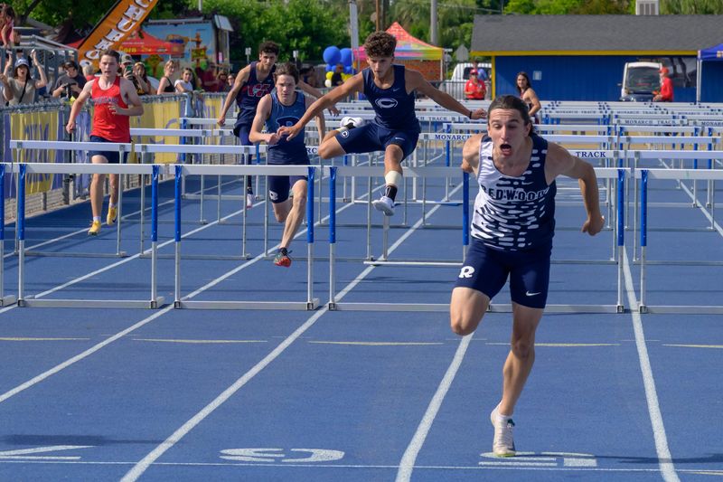 Redwood's Wyatt Ruby takes the win in the boys 110m Hurdles at the Don Kavadas Tulare County Track and Field Championships held April 24, 2026 at Monarch Stadium, Exeter Union High School.