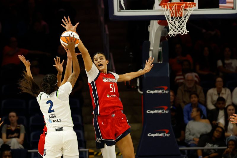 Apr 25, 2026; Washington, DC, USA; Washington Mystics center Lauren Betts (51) blocks the shot of Minnesota Lynx forward Liatu King (2) in the first half at Entertainment & Sports Arena. Mandatory Credit: Geoff Burke-Imagn Images