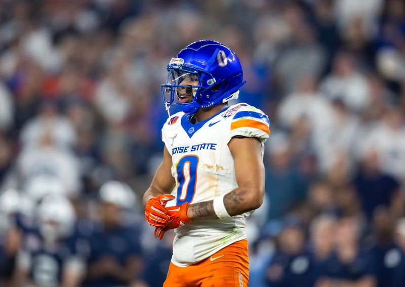 Dec 31, 2024; Glendale, AZ, USA; Boise State Broncos safety Ty Benefield (0) against the Penn State Nittany Lions during the Fiesta Bowl at State Farm Stadium. Mandatory Credit: Mark J. Rebilas-Imagn Images