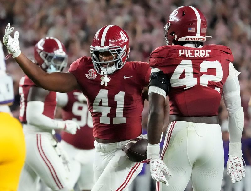 Nov 8, 2025; Tuscaloosa, Alabama, USA; Alabama linebacker Nikhai Hill-Green (41) celebrates after recovering a LSU fumble at Saban Field at Bryant-Denny Stadium. Mandatory Credit: Gary Cosby Jr.-Imagn Images
