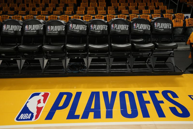 Apr 18, 2026; Los Angeles, California, USA; The NBA Playoffs logo on the court during game one of the first round of the 2026 NBA Playoffs between the Los Angeles Lakers and the Houston Rockets at Crypto.com Arena. Mandatory Credit: Kirby Lee-Imagn Images
