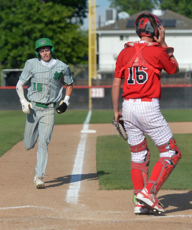 St. Mary's Gino Lovotti scores a run during their game against Lincoln in Stockton Tues. April 28, 2026.