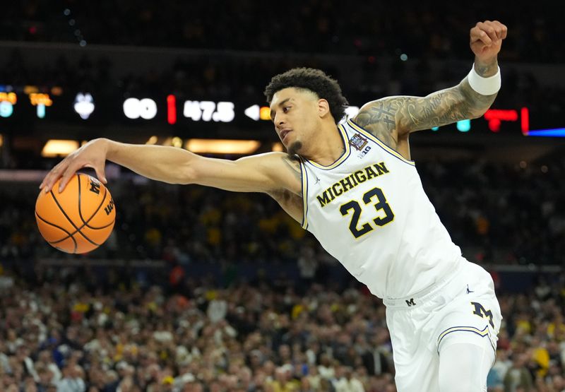 Apr 6, 2026; Indianapolis, IN, USA; Michigan Wolverines forward Yaxel Lendeborg (23) in action against the Connecticut Huskies in the second half during the national championship of the Final Four of the men's 2026 NCAA Tournament at Lucas Oil Stadium. Mandatory Credit: Robert Deutsch-Imagn Images