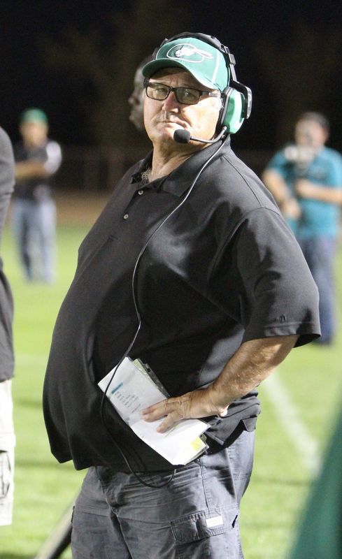 Leland Eudy stands on the sidelines during a football game between Victor Valley and Hesperia on Sept. 9, 2013. The longtime head coach at Victor Valley died on April 26, 2026. He was 72.
