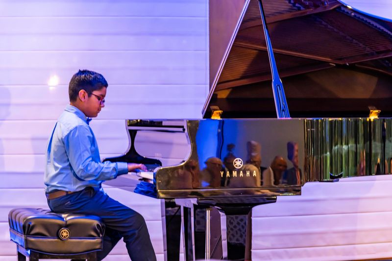Ahad Kiani gives his first public performance.