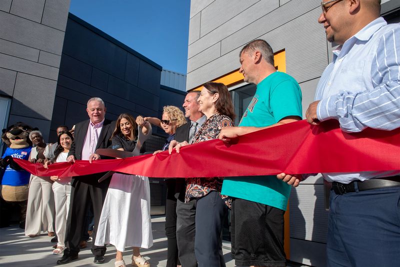 Local dignitaries participate in the ribbon cutting ceremony for the new Ursula Meyer Library and Community Center on Northeast Stockton on Apr. 30, 2026.