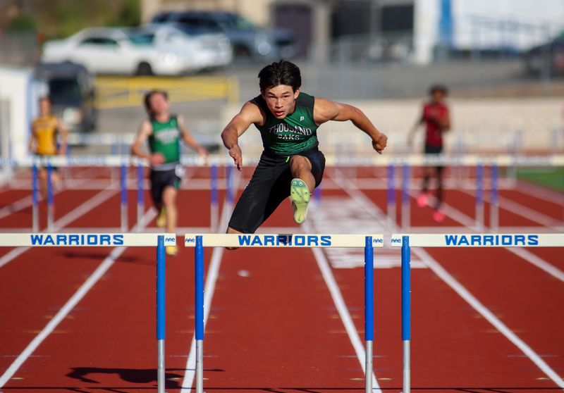 Thousand Oaks senior Lucas Schneider, shown during the Marmonte League Finals on April 30, had the fastest time for the boys 300-meter hurdles and sixth for the 110 hurdles May 9 at the CIF-Southern Section Division 3 Preliminaries at Yorba Linda High. DOMINIC MASSIMINO/THE STAR