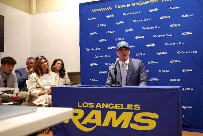 Apr 24, 2026; Inglewood, CA, USA; Los Angeles Rams first-round draft pick Ty Simpson speaks to media as his family attend during a press conference at Code Next at Hollywood Park. Mandatory Credit: Kiyoshi Mio-Imagn Images