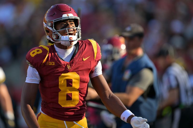 Oct 11, 2025; Los Angeles, California, USA; USC Trojans wide receiver Ja'Kobi Lane (8) celebrates after a touchdown in the first half against the Michigan Wolverines at United Airlines Field at the Los Angeles Memorial Coliseum. Mandatory Credit: Jayne Kamin-Oncea-Imagn Images