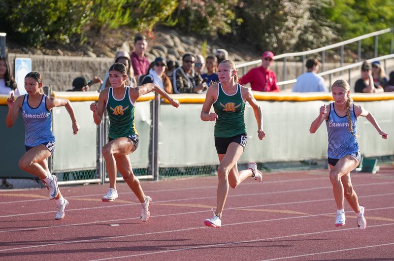Moorpark freshman Camilla Peltonen (second from right) sprints to the win in the girls 100 meters at the Coastal Canyon League Track and Field championships on Friday, May 1, 2026, at Moorpark High. Peltonen won in 11.87 seconds.