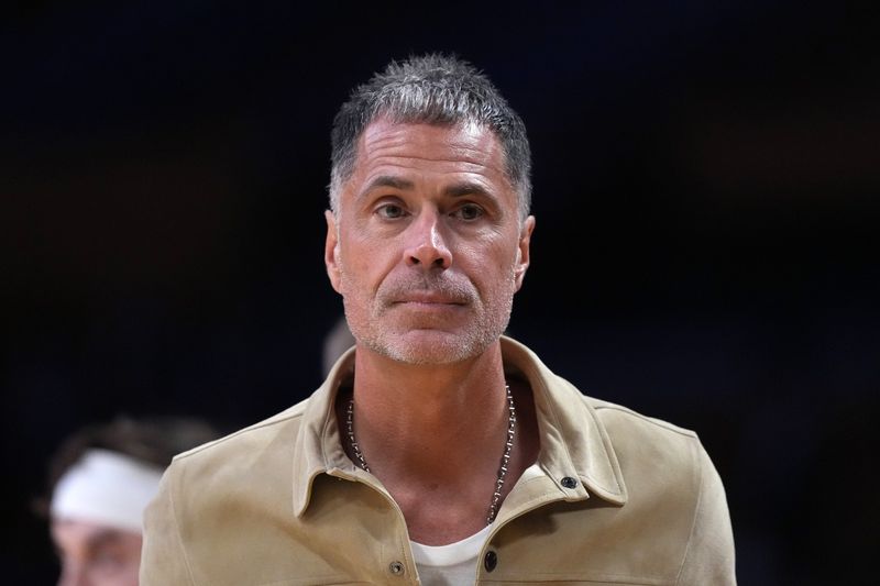 Apr 18, 2026; Los Angeles, California, USA; Los Angeles Lakers general manager Rob Pelinka watches during game one of the first round of the 2026 NBA Playoffs against the Houston Rockets at Crypto.com Arena. Mandatory Credit: Kirby Lee-Imagn Images