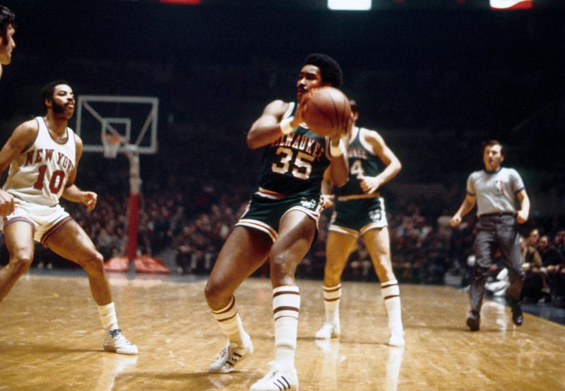 Unknown date; New York, NY, USA; FILE PHOTO; Milwaukee Bucks forward McCoy McLemore (35) is defended by New York Knicks guard Walt Frazier (10) at Madison Square Garden. Mandatory Credit: Manny Rubio-USA TODAY Sports