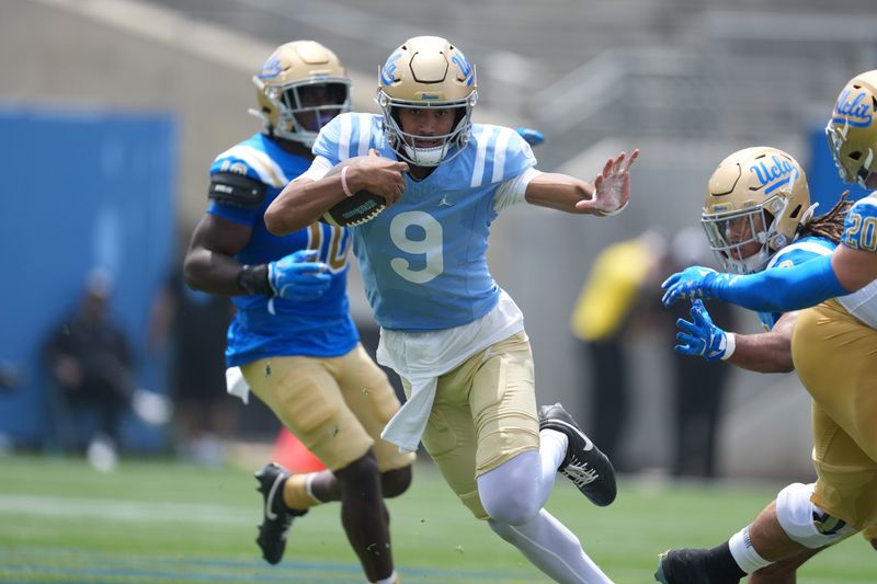 May 2, 2026; Pasadena, CA, USA; UCLA Bruins quarterback Nico Iamaleava (9) carries the ball during the spring game at Rose Bowl. Mandatory Credit: Kirby Lee-Imagn Images