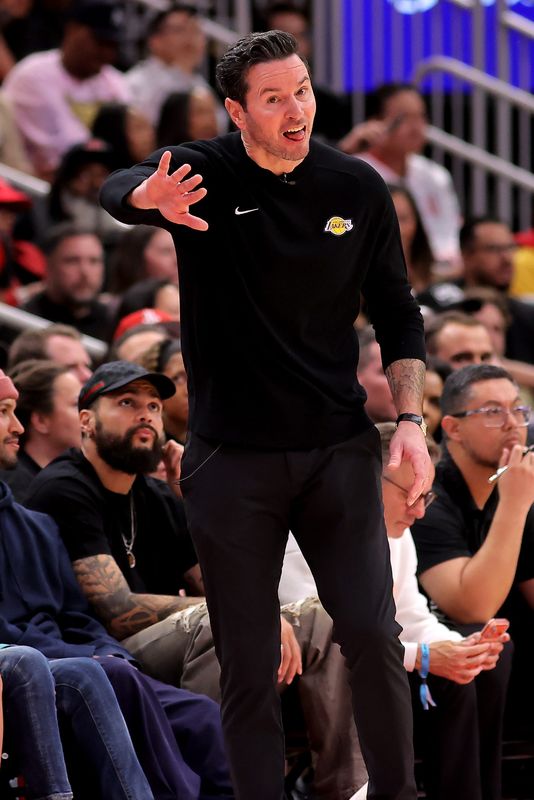 May 1, 2026; Houston, Texas, USA; Los Angeles Lakers head coach JJ Redick on the sidelines against the Houston Rockets during the fourth quarter of game six of the first round of the 2026 NBA Playoffs at Toyota Center. Mandatory Credit: Erik Williams-Imagn Images