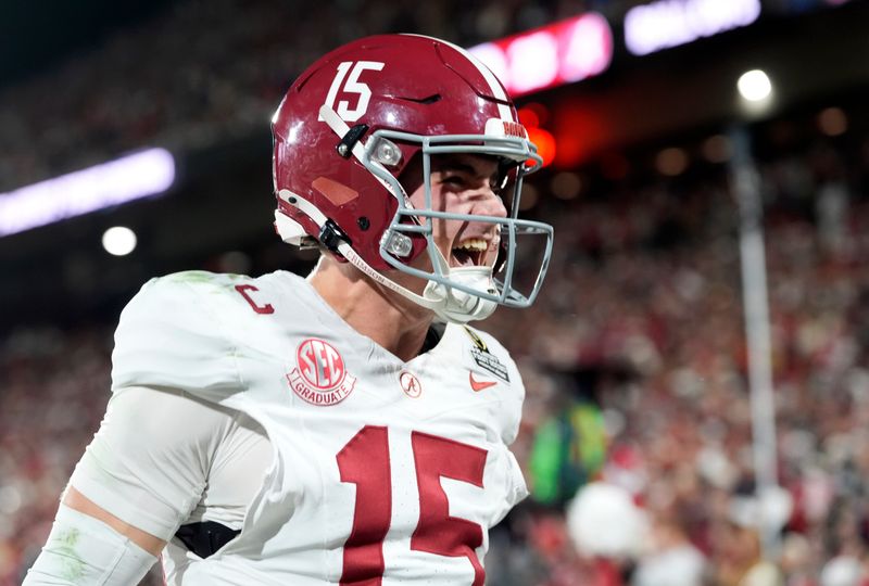 Alabama's Ty Simpson (15) a touchdown pass during the College Football Playoff game between the University of Oklahoma Sooners (OU) and the Alabama Crimson Tide at the Gaylord Family â€“ Oklahoma Memorial Stadium in Norman, Okla., Friday Dec. 19, 2025.